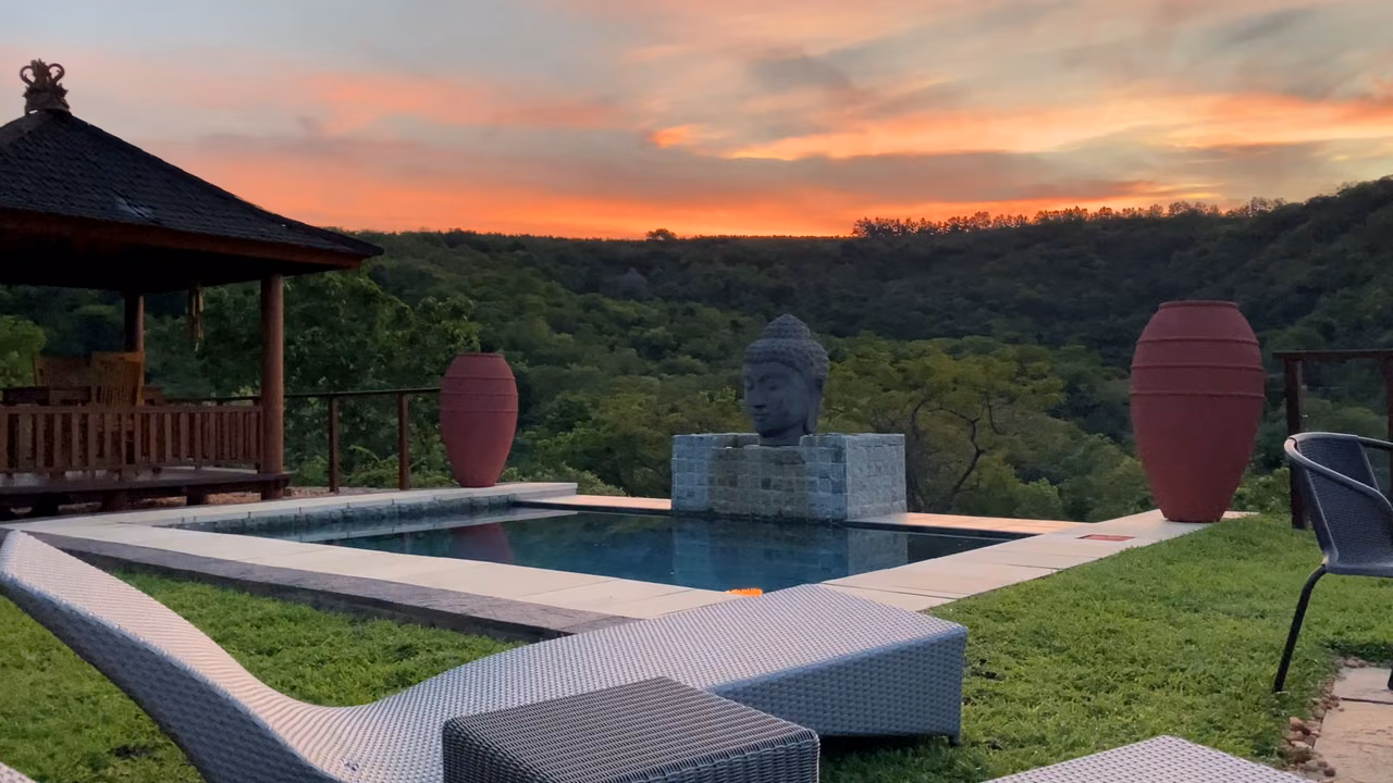 The pool at sunset, looking out over the Sabie Valley
